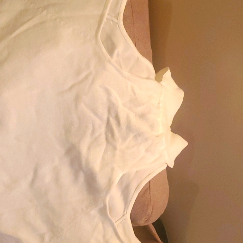 White worn once shoulders out mock neck